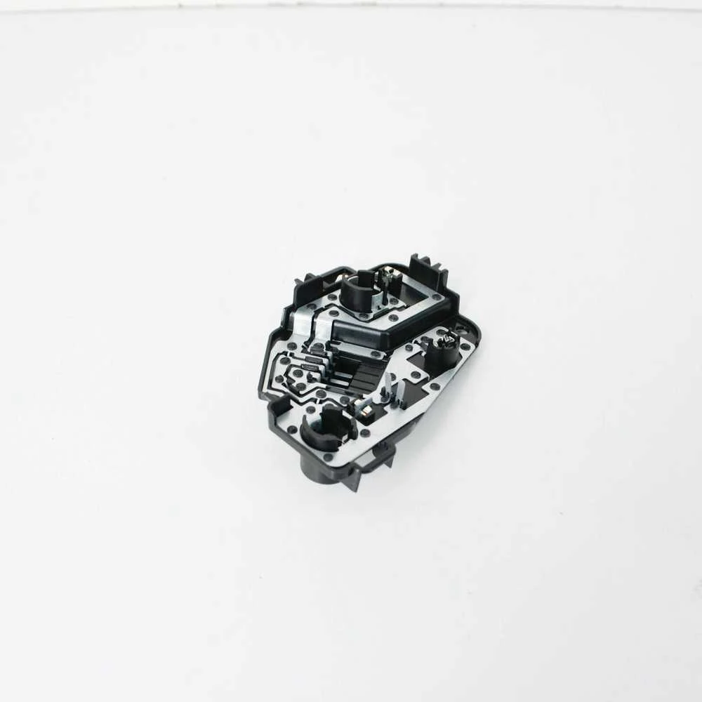 BMW F45 galinio žibinto laikiklis galinių durų kairės pusės originalus 63217391841