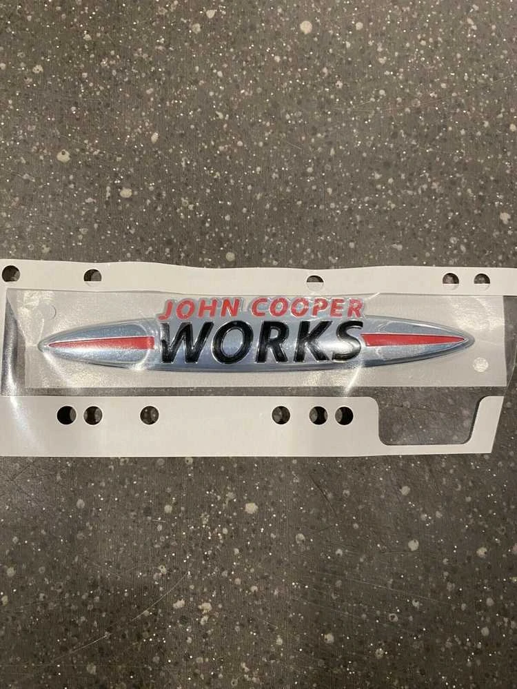 BMW MINI JCW išlenkta priekinių grotelių emblema F55/F56/F57 LCI 51115A346F8 Originali