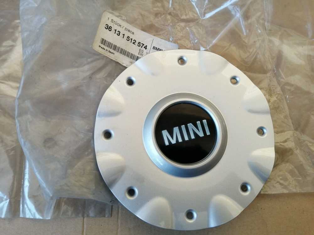 BMW MINI R50 R52 2001-2008 m. Ratų centro stebulės dangtelis sidabrinės spalvos originalus 36131512574