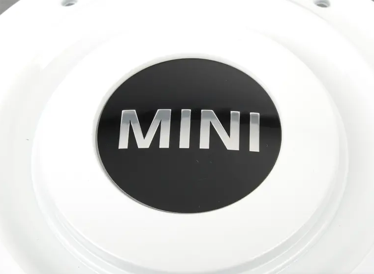 BMW MINI R50 stebulės dangtelis su MINI logotipu, baltos spalvos, originalus 36131512573