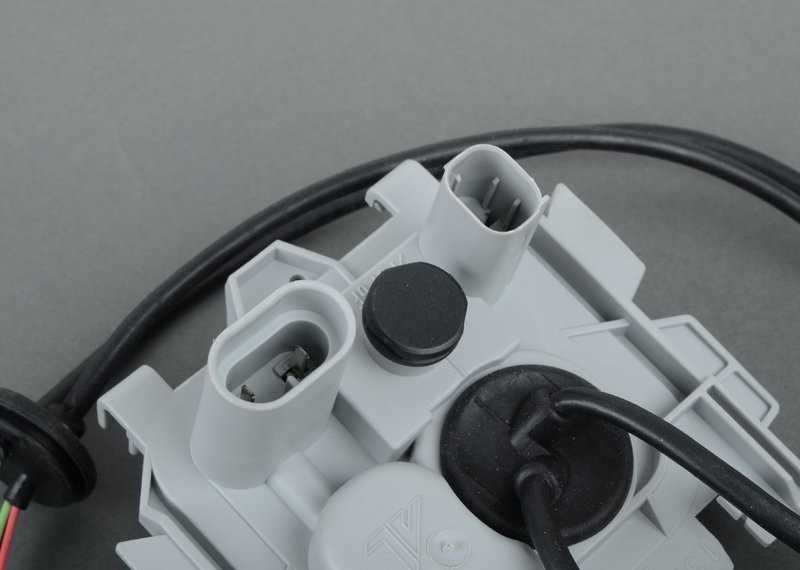 BMW priekinių žibintų valdymo modulio laikiklis kairėje pusėje Originalus 63126924283