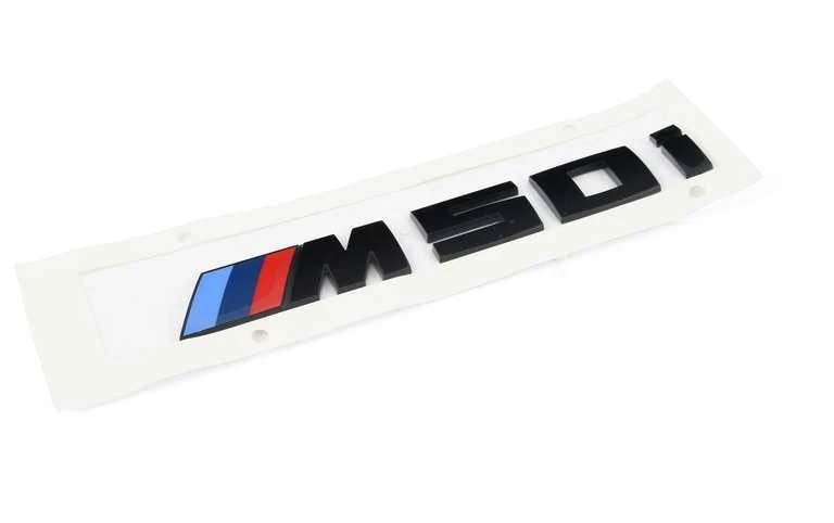 BMW X6 G06 blizgus juodas bagažinės ženkliukas M50i originalus 51142472842
