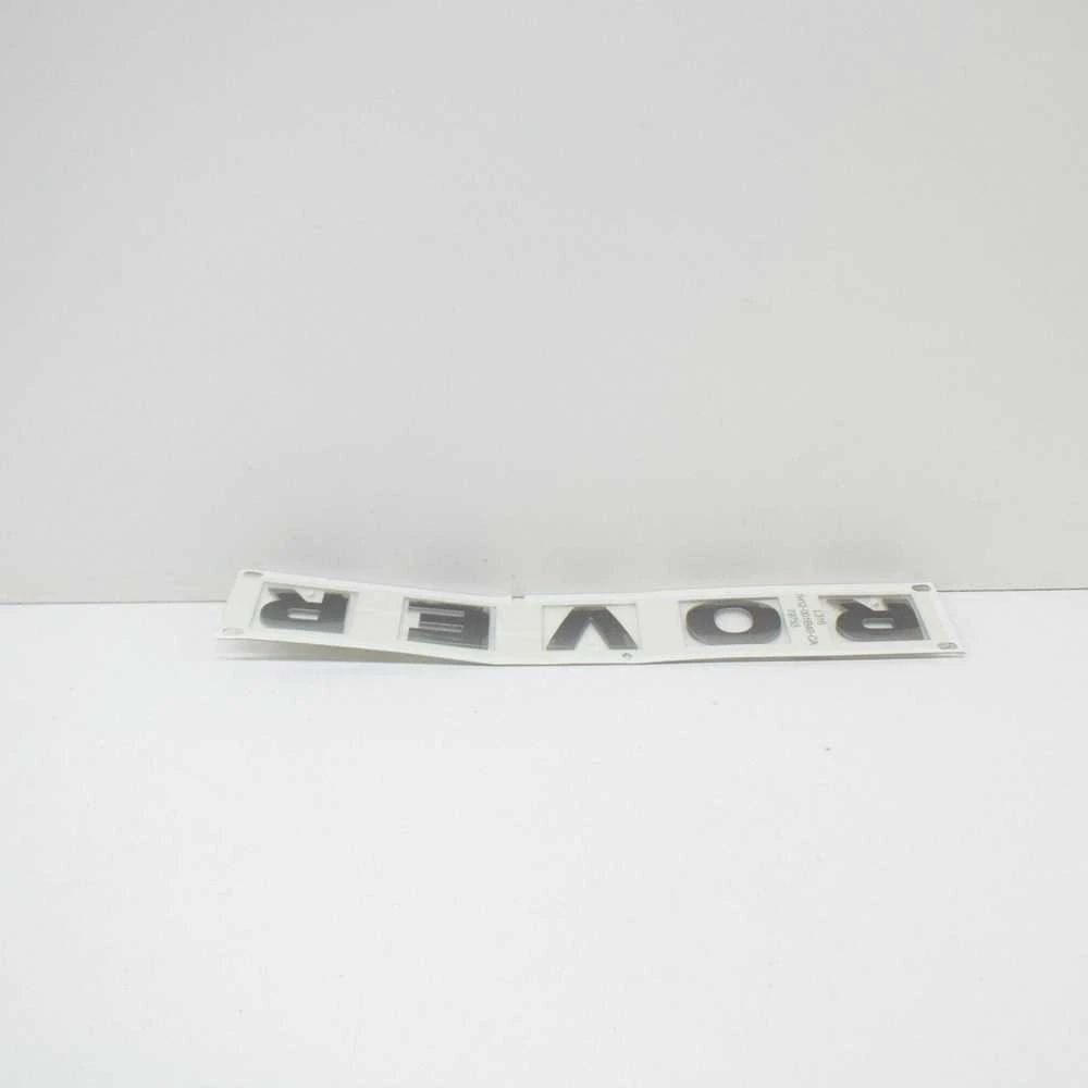 LAND ROVER DEFENDER Kapotas ROVER Emblema DAB500300 Naujas Originalus