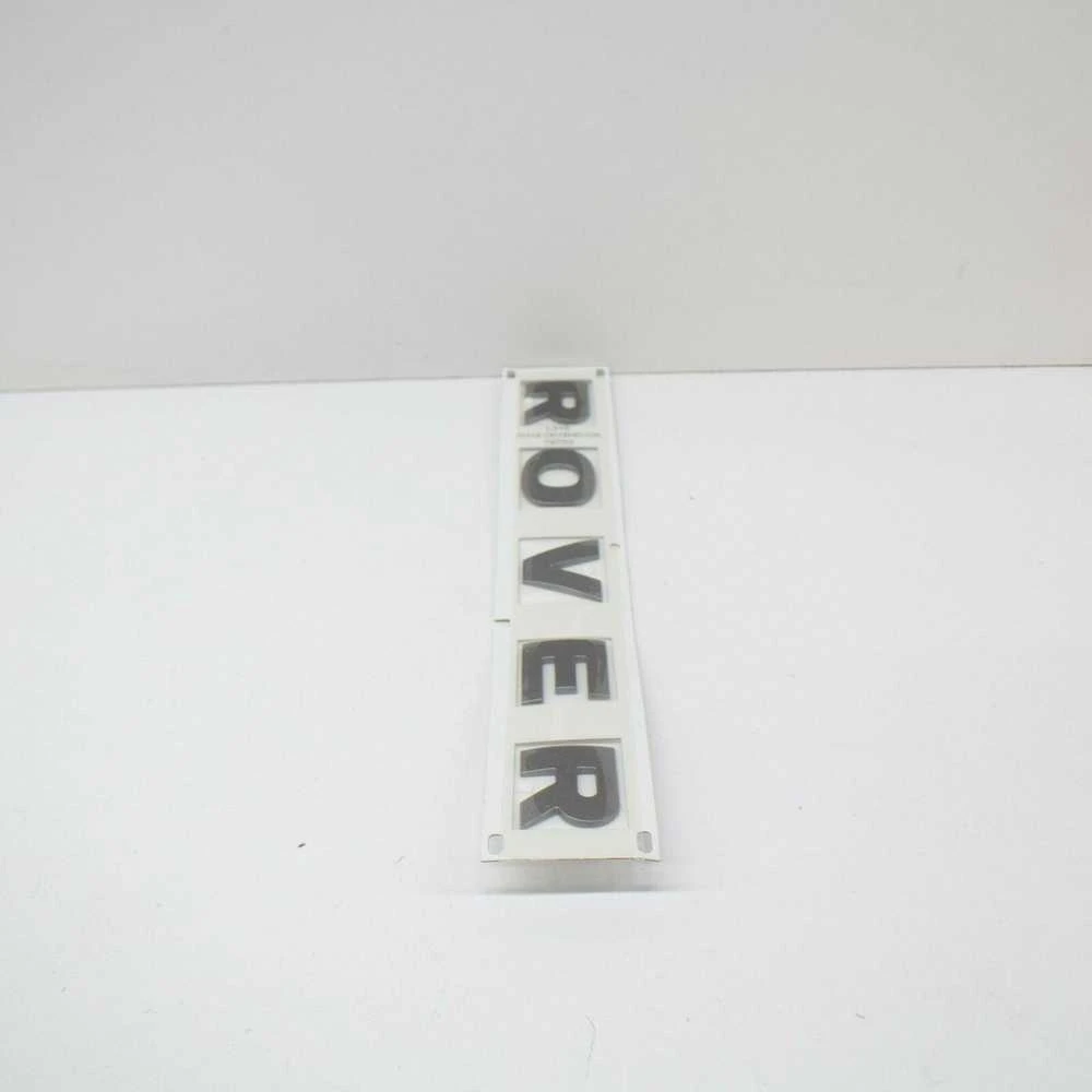 LAND ROVER DEFENDER Kapotas ROVER Emblema DAB500300 Naujas Originalus