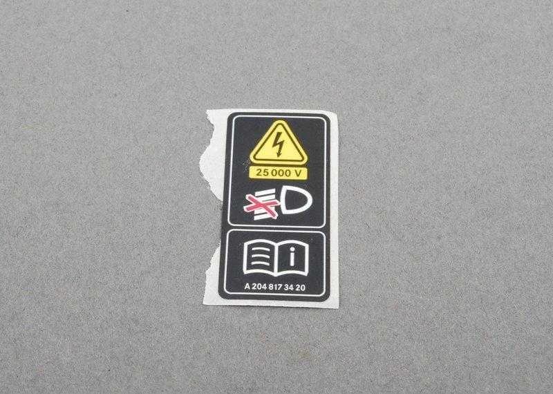 Mercedes Benz MB CLA C117 Xenon šviesos aukštos įtampos įspėjimo etiketė A2048173420 NAUJA ORIGINALI