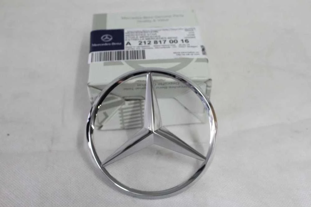 "Mercedes-Benz W212 Estate" galinio bagažinės dangčio ženkliukas "Star" originalus A2128170116