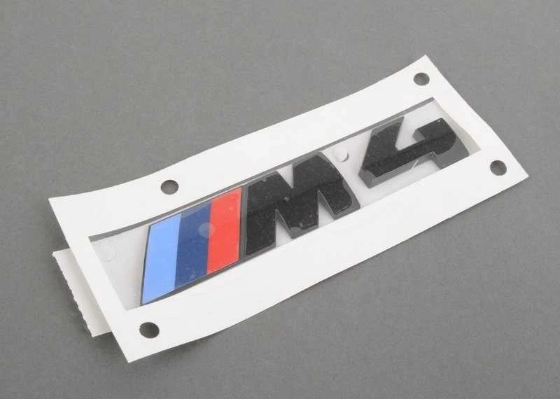 Originalus 2016 m. BMW M4 F83 bagažinės M4 ženkliukas juodas galinis 51148068579