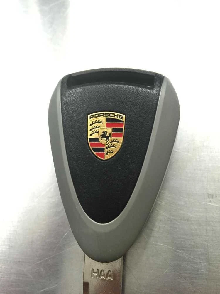 "Porsche 911 Cayenne Boxster" herbo emblema, skirta nuotolinio rakto galvutės pulteliui, originali