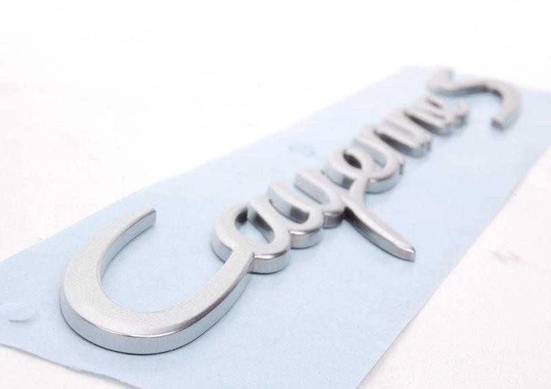 Porsche Cayenne S Bagažo Dangčio Emblema Ženklelis Sidabrinis Originalus 95855967600