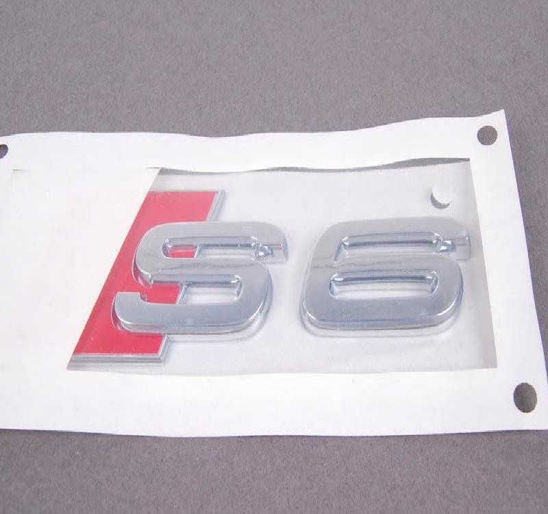VAG Audi A6 C4 C5 C6 C7 emblema su ženkliuku ant S6 durelių originali 4B08537352ZZ