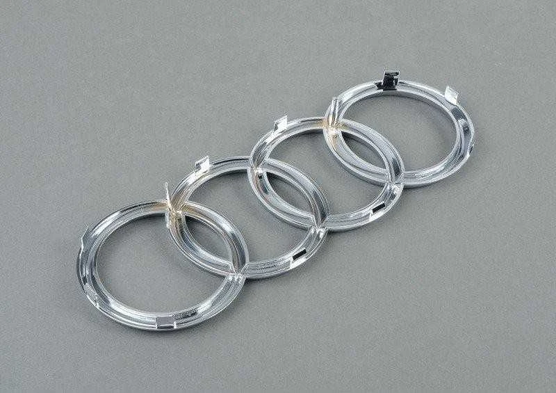 VAG AUDI NAUJA AUTENTIŠKA Q5 2008-2016 PRIEKINĖS ŽENKLO GRILIO EMBLEMA 8R0853605