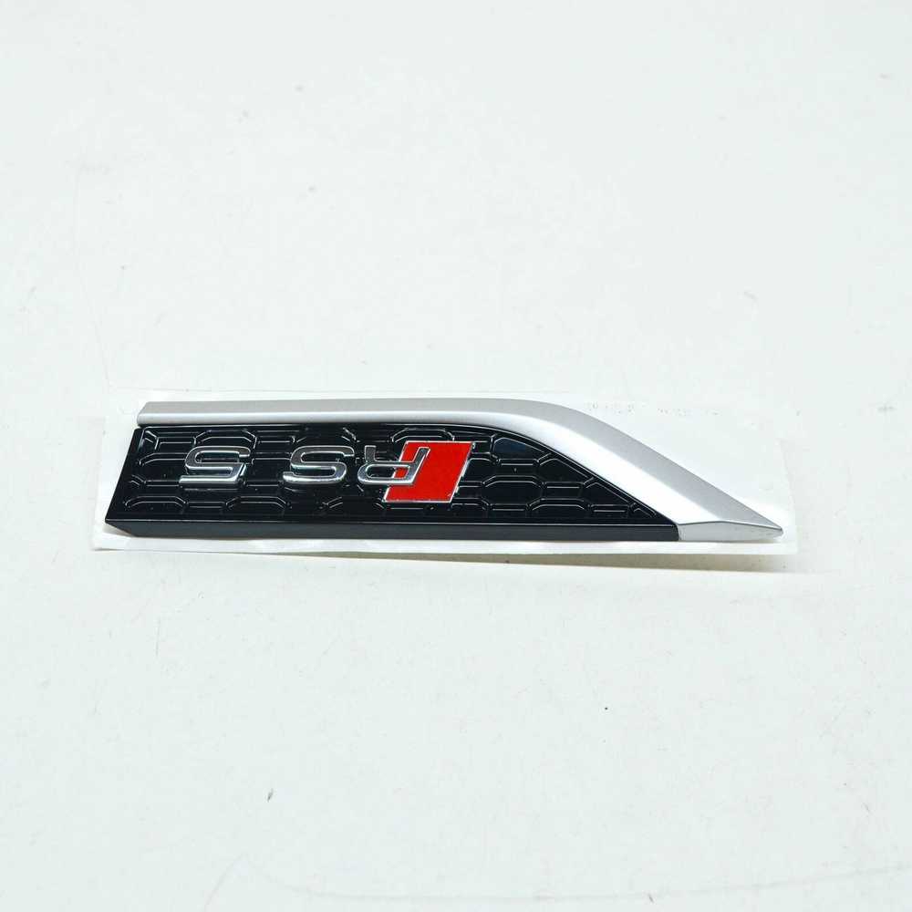 VAG NAUJAS AUDI RS5 8W6 PRIEKINIS KAIRĖS PUSĖS KREIVĖS EMBLEMA ŽENKLAS 8W6853601DPUZ ORIGINALUS