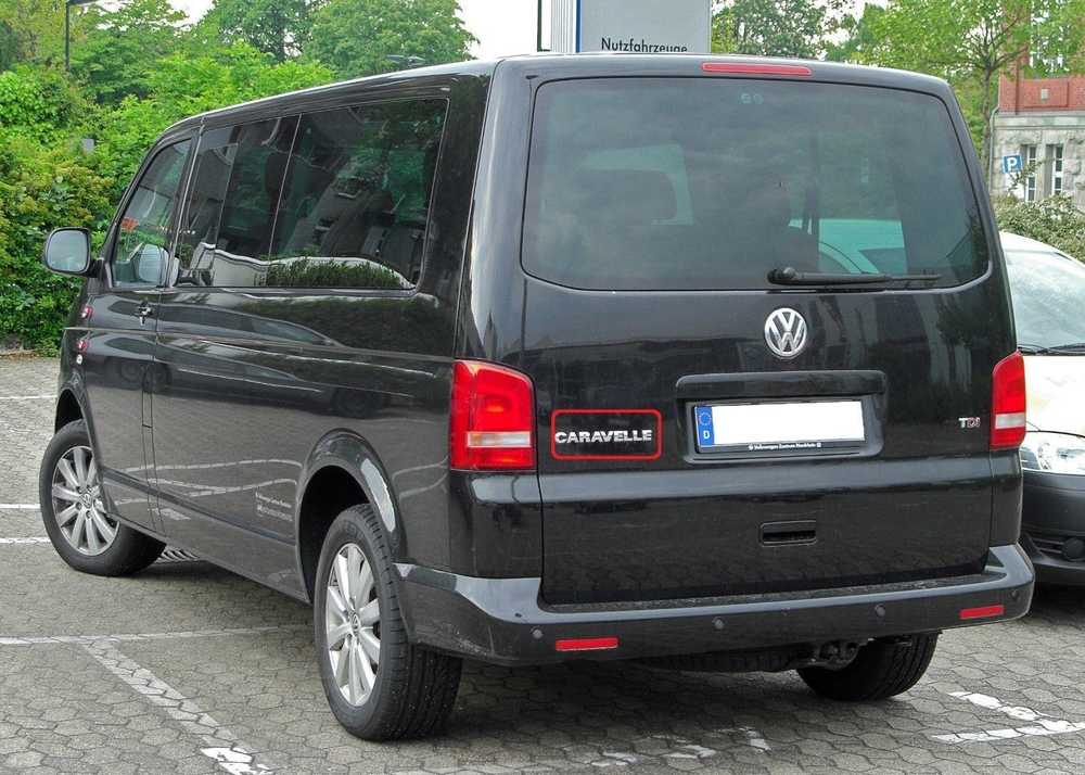 VAG Naujas originalus VW TRANSPORTER (03-11) galinis bagažinės \"CARAVELLE\" užrašas B