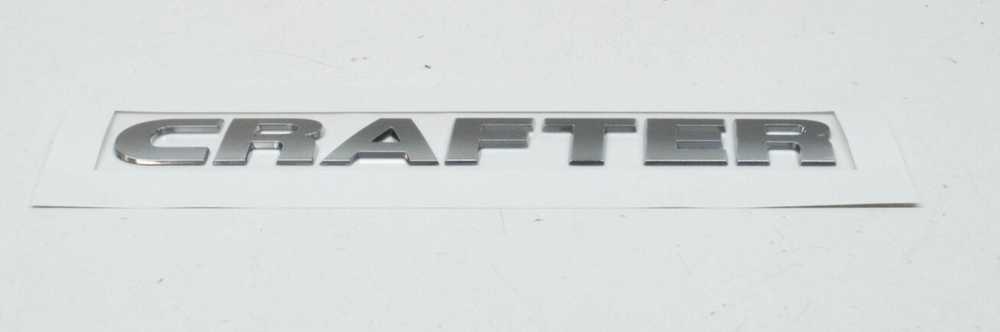 VAG VOLKSWAGEN CRAFTER MK2 Galinis užrašo ženkliukas 2E0853687A2ZZ Originalus