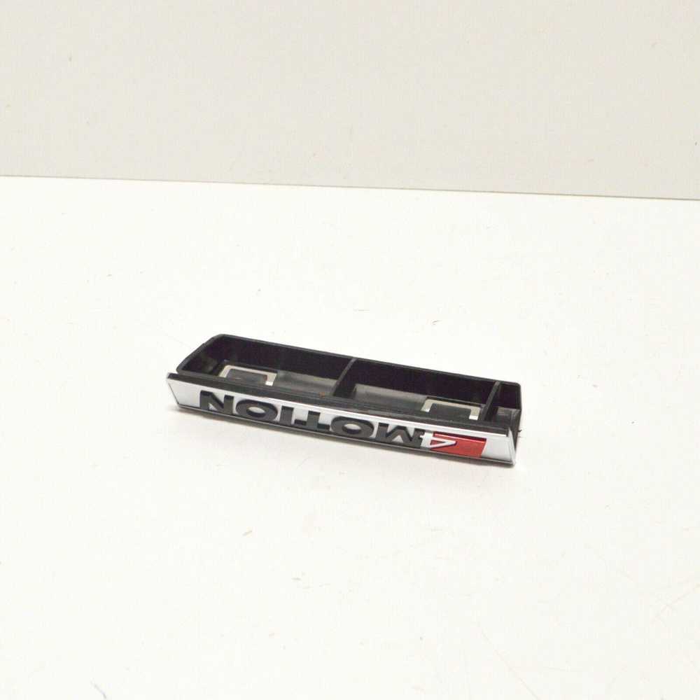 VAG Volkswagen CRAFTER Priekinis Bamperio Grotelės Emblema 7C0853948MGM NAUJAS ORIGINALUS