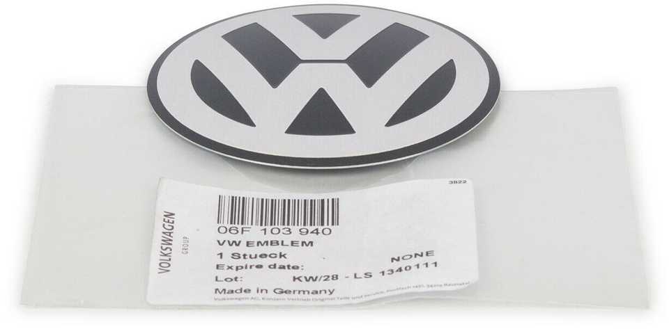 VAG Volkswagen Golf MK5 variklio dangčio emblema originali 06F103940