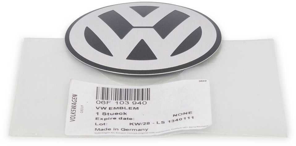 VAG Volkswagen Golf MK5 variklio dangčio emblema originali 06F103940