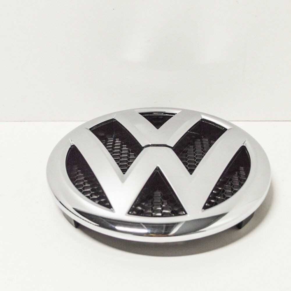 VAG Volkswagen TRANSPORTER T5 priekinių grotelių ženkliukas 7E0853601C739 originalus