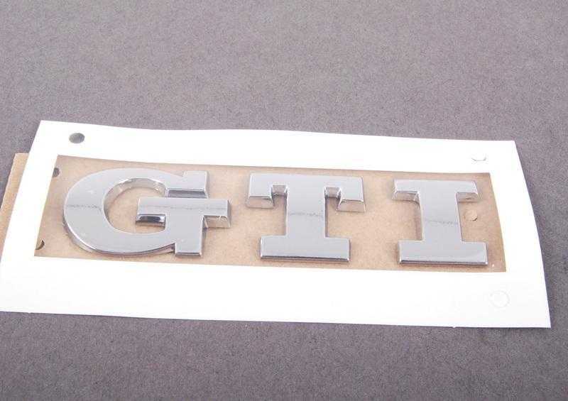 VAG VW GTI Golf 5 6 Užrašas Emblema Volkswagen logotipas Ženkliukas Chrome Galinis originalus 1K0853675BJ739