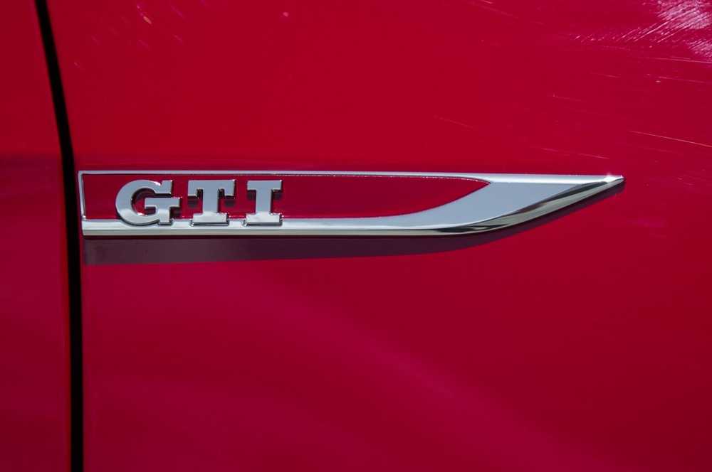 VAG VW logotipas emblema kairėje originali 5G0853688A