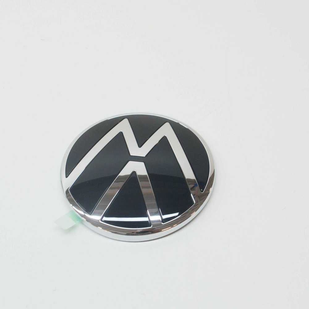 VAG VW TIGUAN AD MK2 galinė emblema su ženkliuku originali 5NA853630CDPJ
