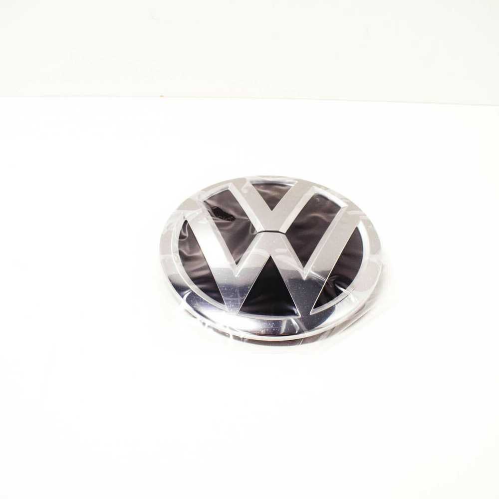 VAG VW TIGUAN priekinio bamperio radiatoriaus grotelės ženkliukas originalus 2K5853600