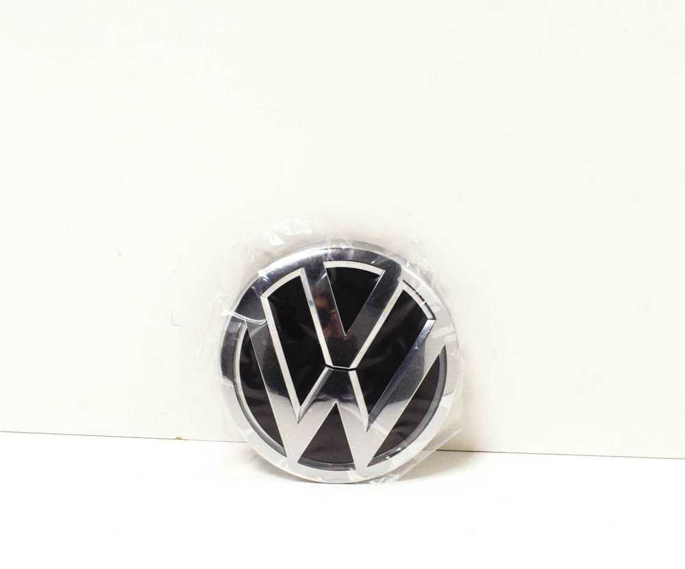 VAG VW TIGUAN priekinio bamperio radiatoriaus grotelės ženkliukas originalus 2K5853600