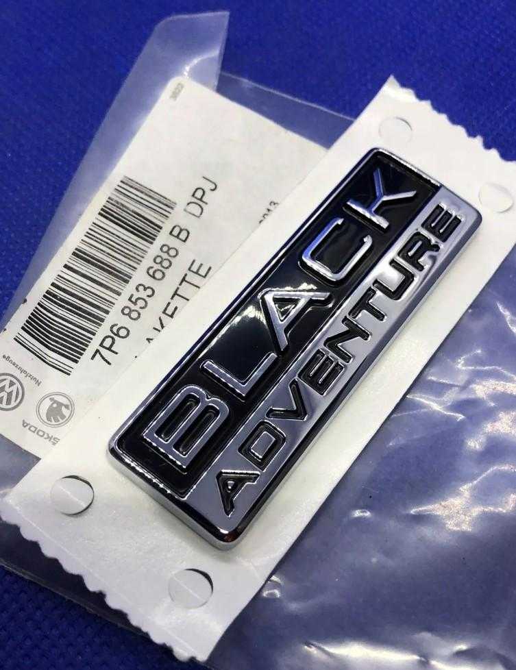 VAG VW Touareg juodas nuotykių emblema bagažinės dangtis 7P6853688BDPJ originalus