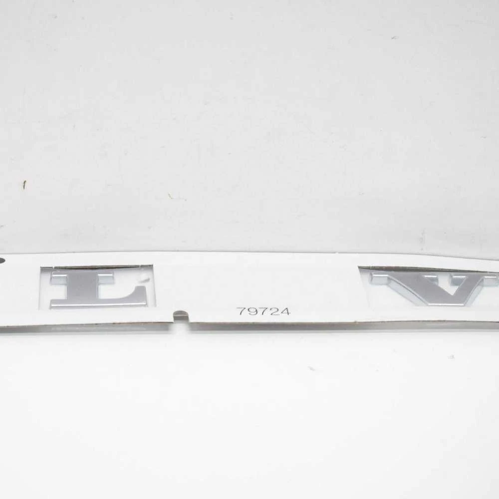 VOLVO C30 galinė emblema su ženkliuku Originali 31213612