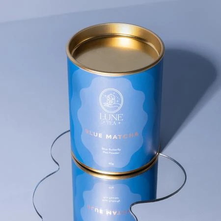 Blue Matcha milteliai Lune Tea cilindro formos pakuotėje