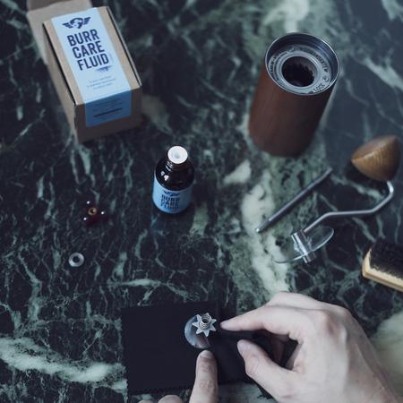 Kavamalė Comandante Užsakymas - Burr Care Fluid Set