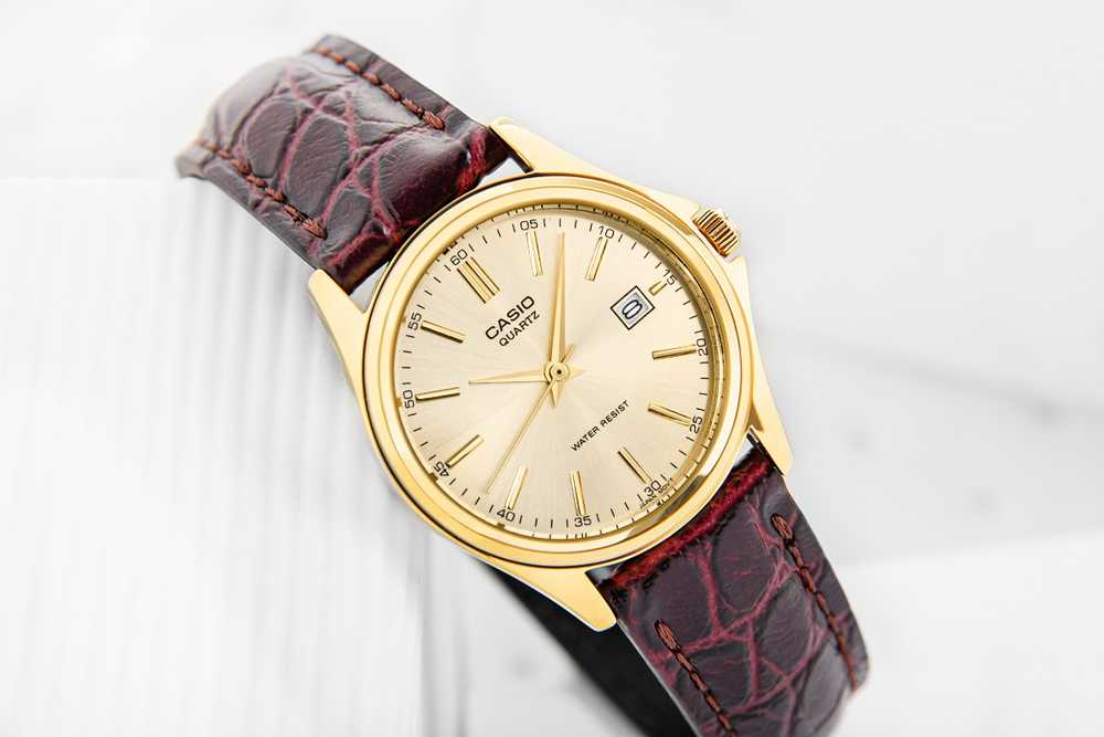 CASIO Moteriškas Laikrodis LTP-1183Q-9A Auksinis Dialas