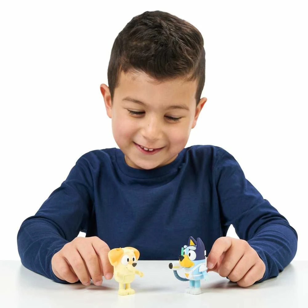 Bluey - Bluey figūrėlių 2 vnt. pakuotė - Staigmenos Blasterio kostiumas (90322)
