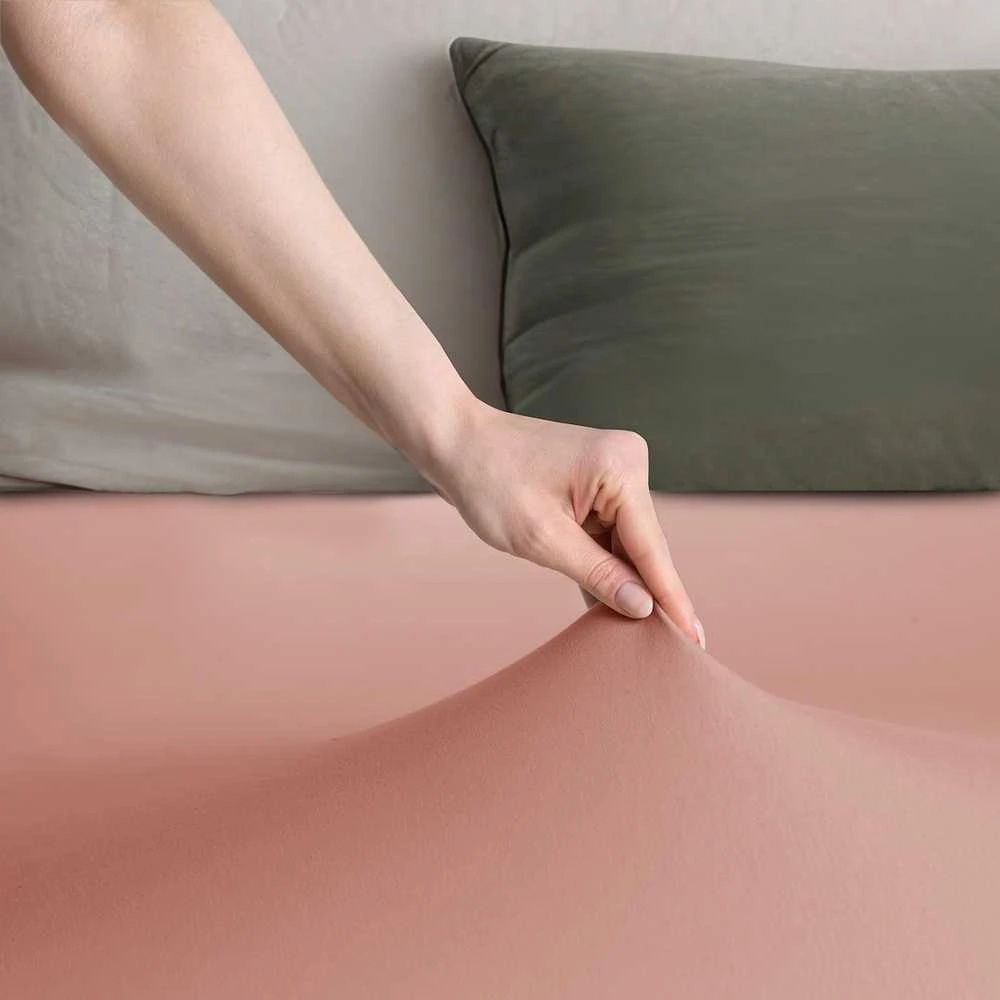 DecoKing Paklodė su guma persiko spalvos 80–90x200+30 cm