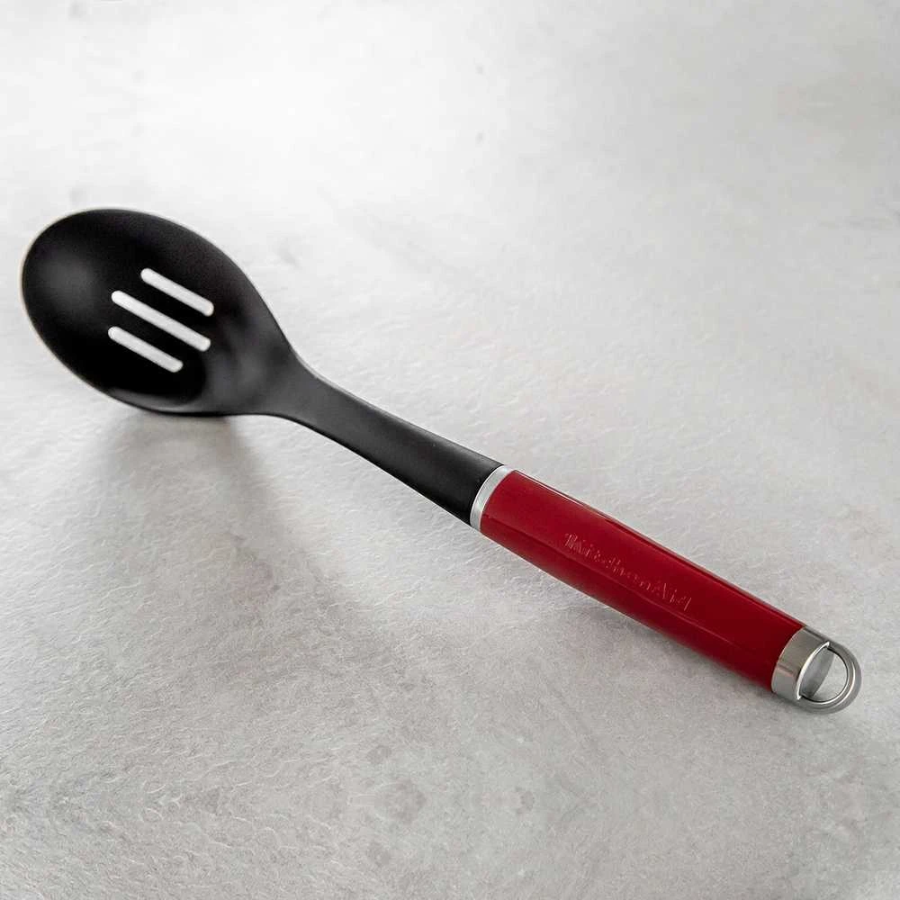 KitchenAid virtuvinis šaukštas su skylutėmis CORELINE Empire Raudona