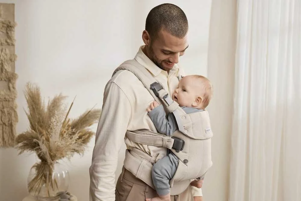 BabyBjorn Harmony - ergonomiška nešynė naujagimiams ir kūdikiams | Austi šviesiai smėlio spalvos