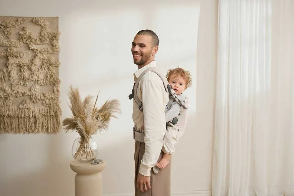 BabyBjorn Harmony - ergonomiška nešynė naujagimiams ir kūdikiams | Austi šviesiai smėlio spalvos