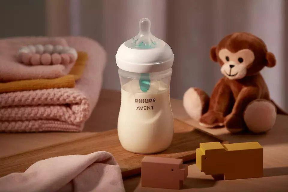Avent buteliukas su žydru vožtuvu ir žaislais
