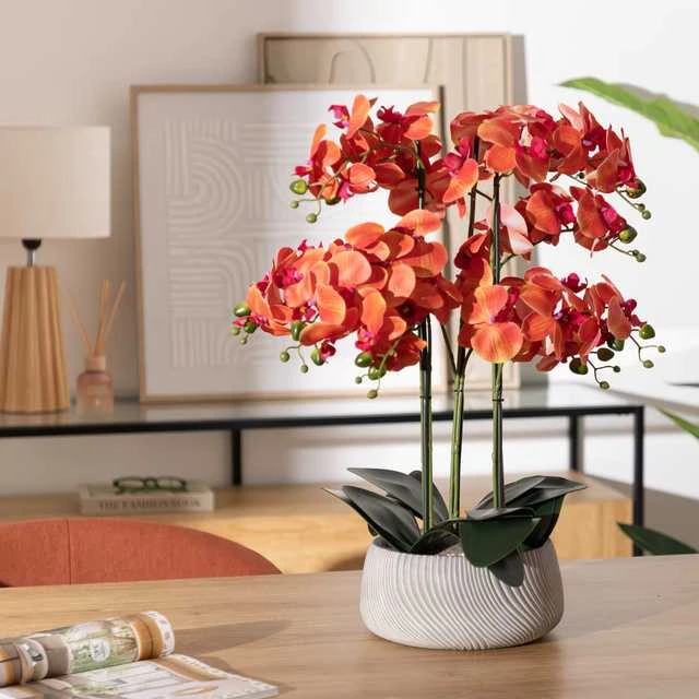 Oranžinė dirbtinė orchidėja SANAE pilkame vazone