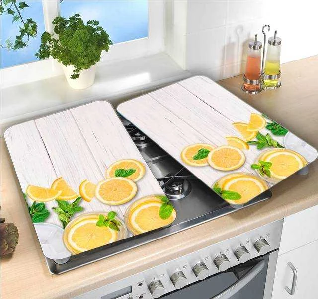 Karščiui atsparios plokštės orkaitės apsaugai, 2 stiklo plokštės su dekoratyviniu raštu + neslidžios kojelės - 52 x 30 cm, WENKO