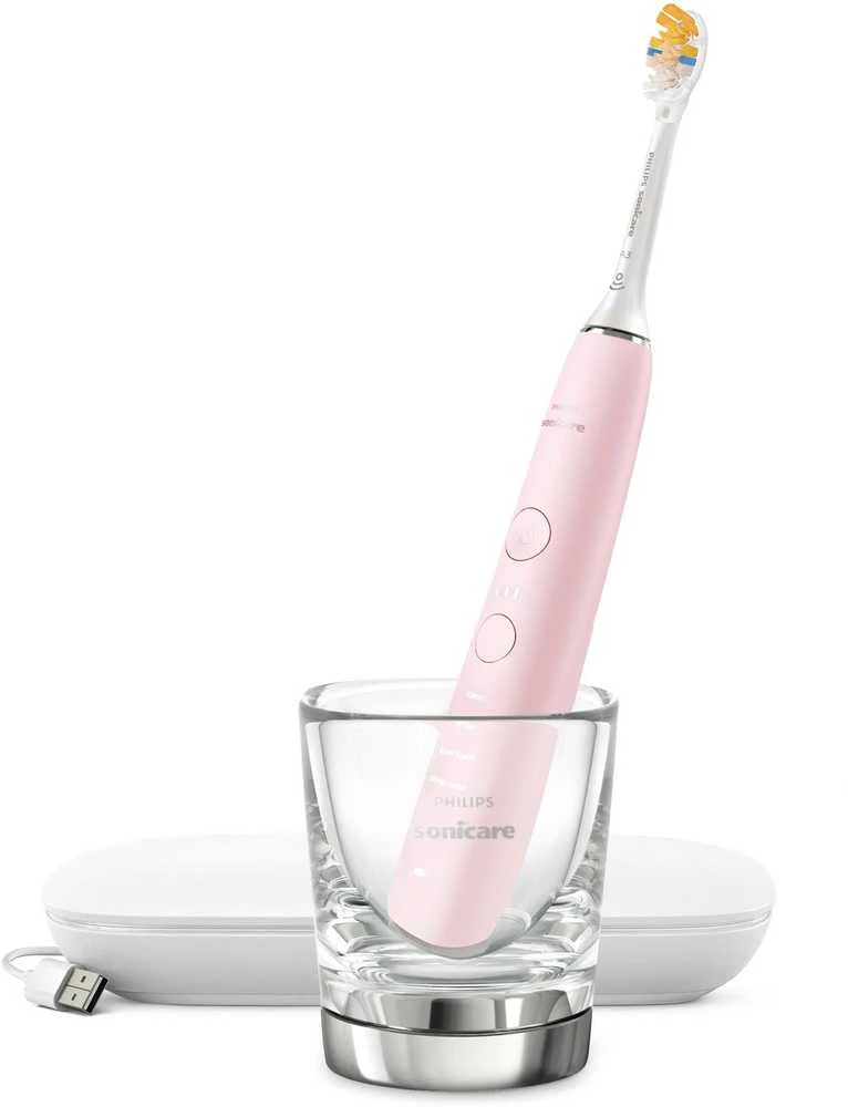 Philips Sonicare 9000 rožinis šepetėlis stiklinėje su įkrovikliu