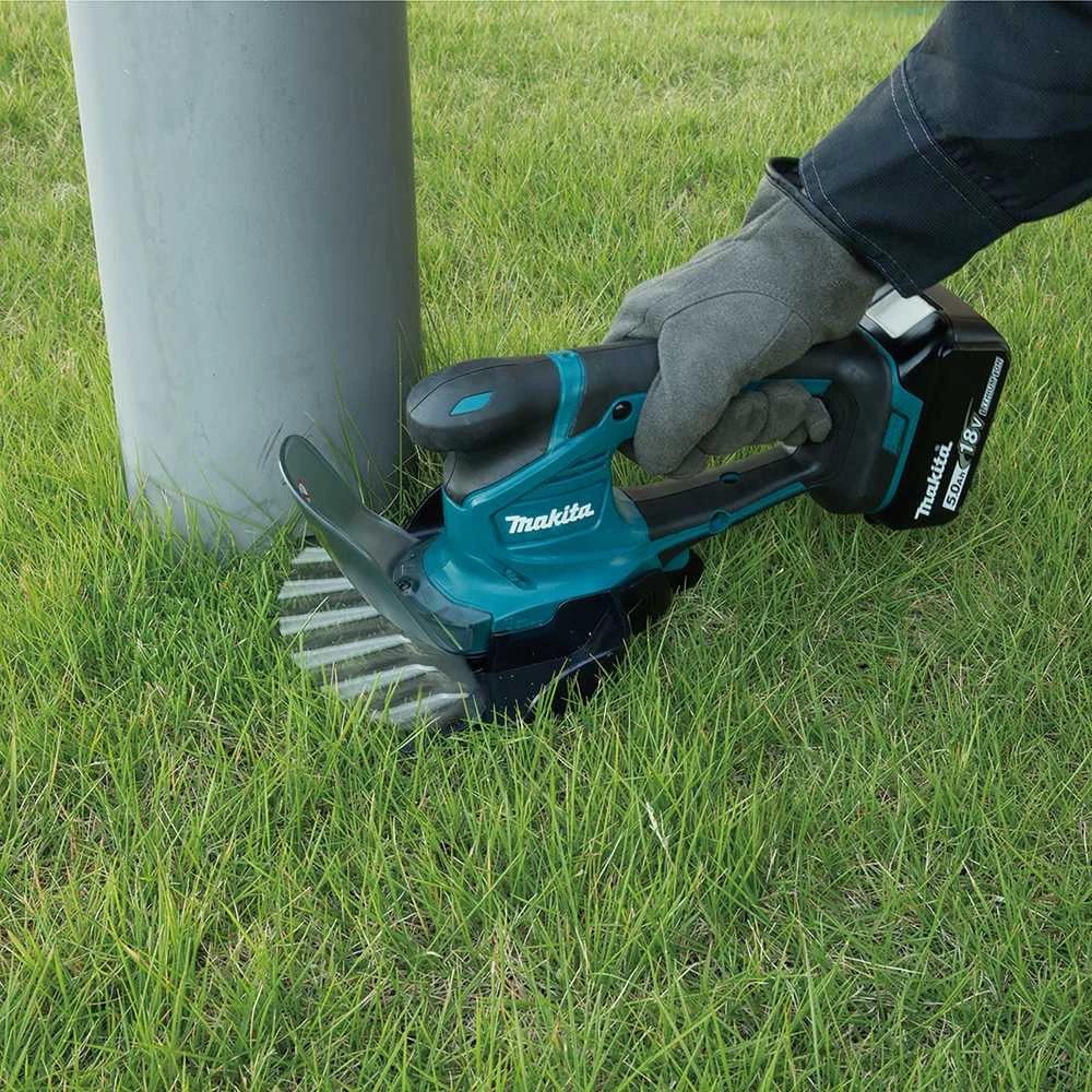 Žolės ir krūmų žirklės Makita DUM604SYX 18 V, 1x1,5 Ah