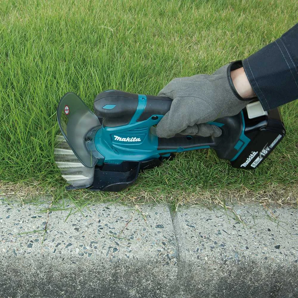Žolės ir krūmų žirklės Makita DUM604SYX 18 V, 1x1,5 Ah