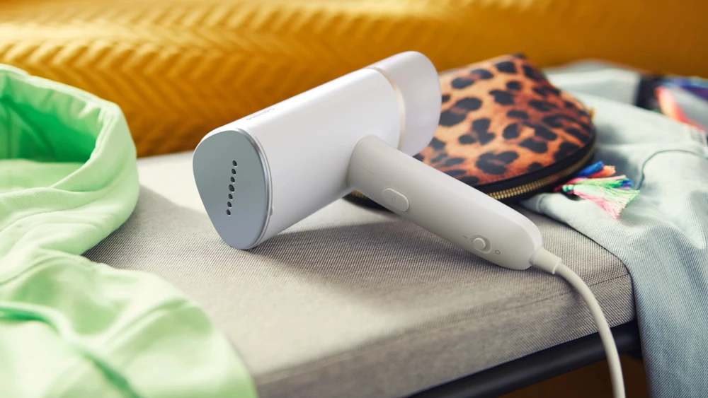 Philips 3000 serijos rankinis garintuvas STH3020/10 Kompaktiškas ir sulankstomas Paruoštas naudoti per ~30 sekundžių 1000W, iki 20g/min. Nereikia lyginimo lentos