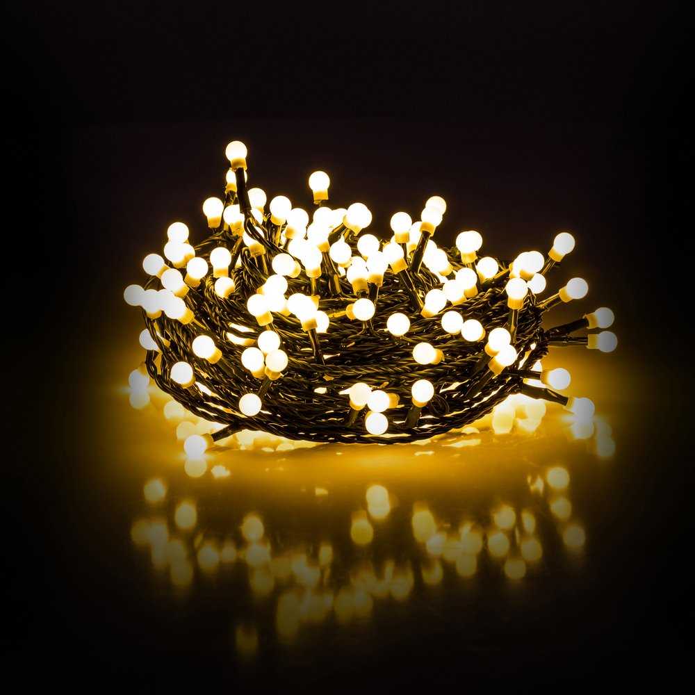 Kalėdinės lemputės Retlux 200 LED šiltai baltos spalvos