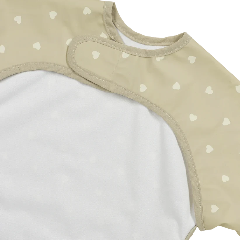 Meyco Baby neperšlampamas seilinukas su rankovėmis 6–24 mėn., Sweet Heart Sand/Soft Sand