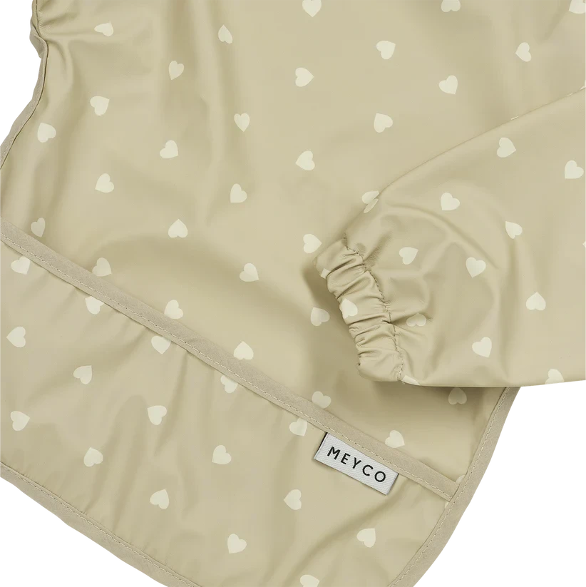 Meyco Baby neperšlampamas seilinukas su rankovėmis 6–24 mėn., Sweet Heart Sand/Soft Sand