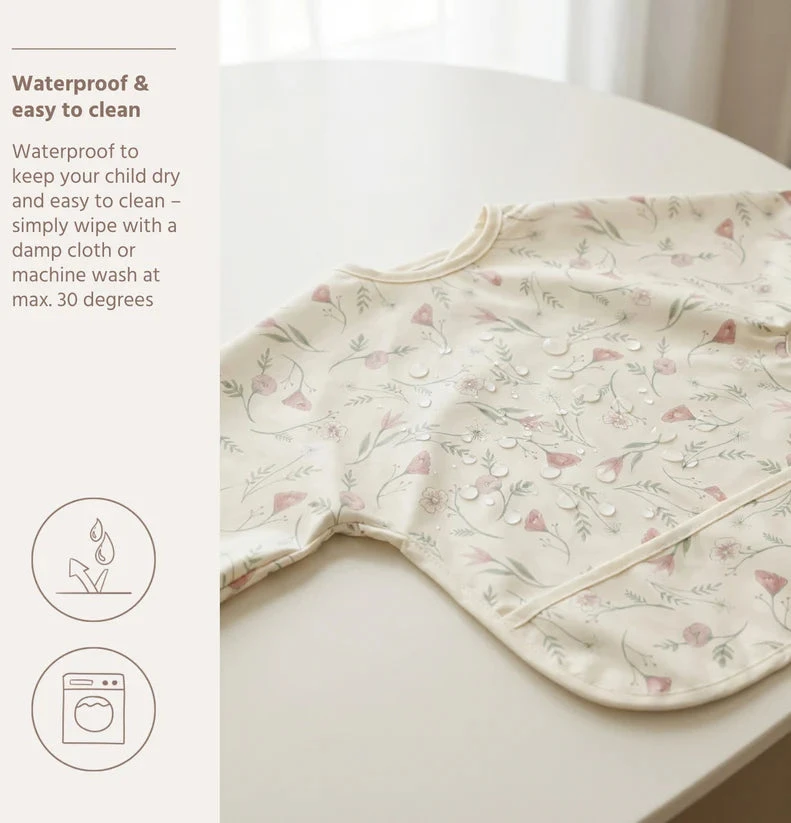 Meyco Baby neperšlampamas seilinukas su rankovėmis 6–24 mėn., Flower Multicolour