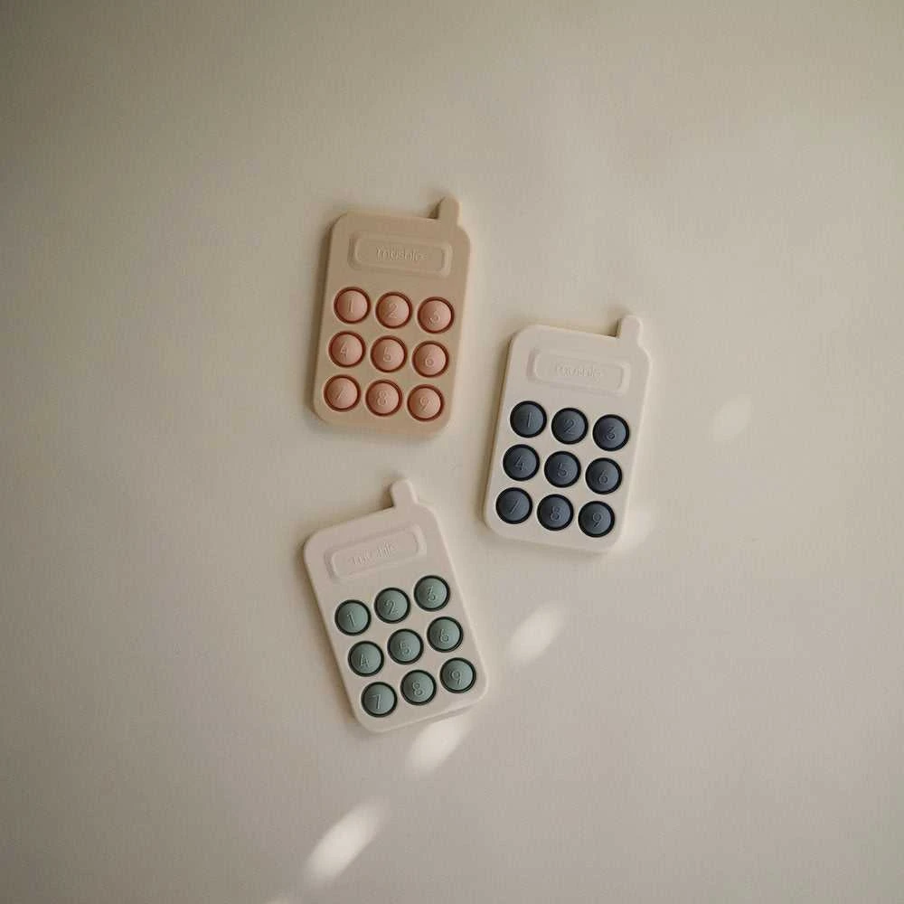Mushie pop it žaislas Telefonas Blush