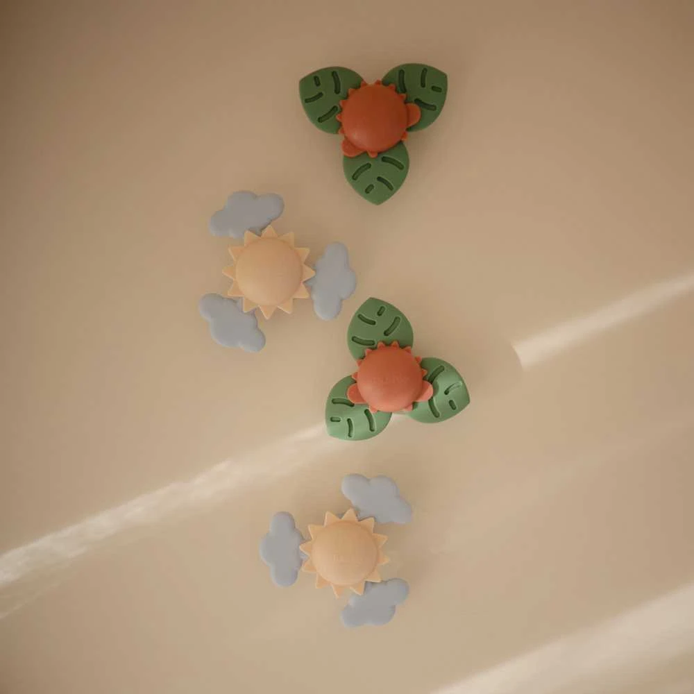 Mushie prilimpantis sukamasis žaislas (spinner) Dino